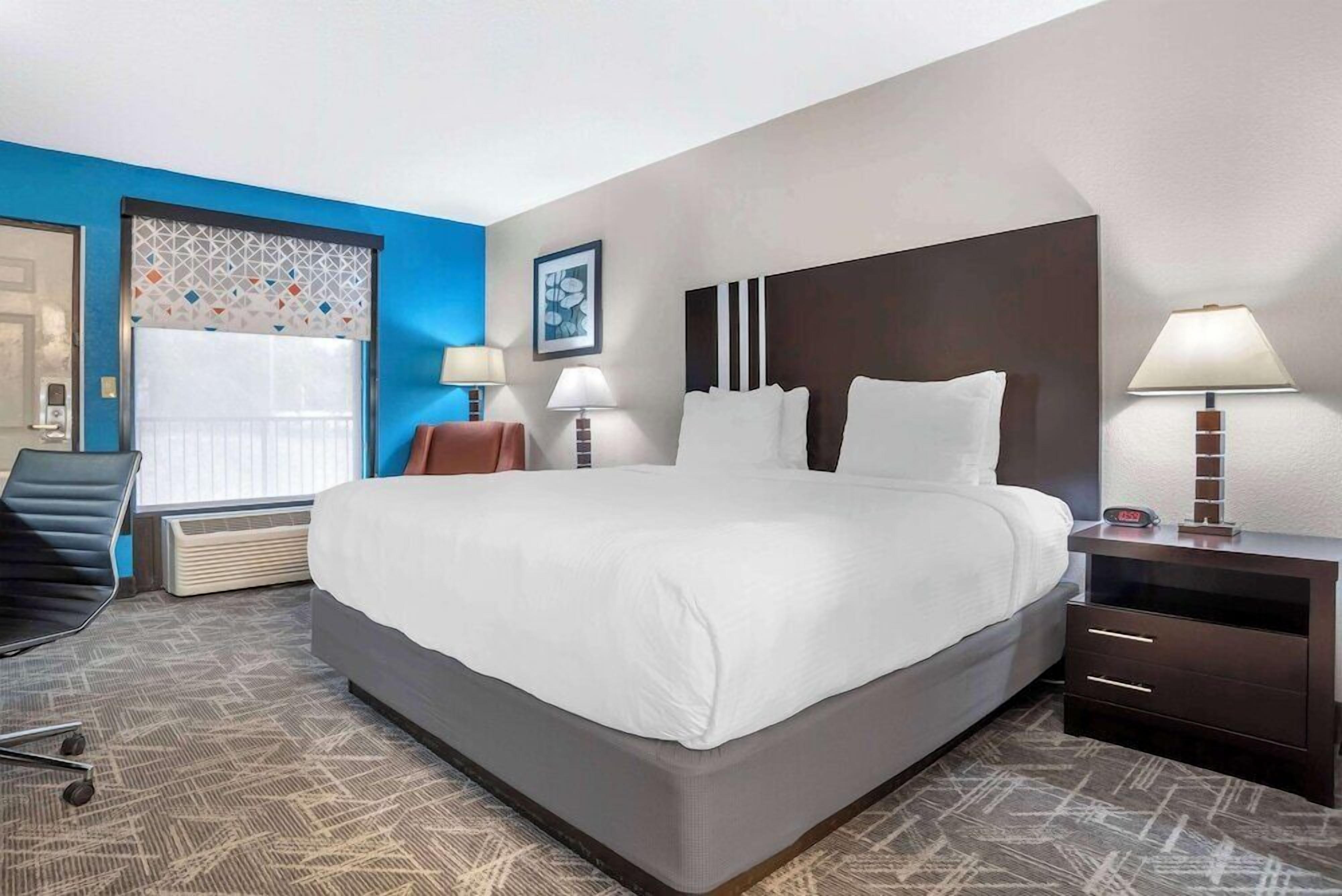 Pillow-top beds, desk, laptop workspace, iron/ironing board