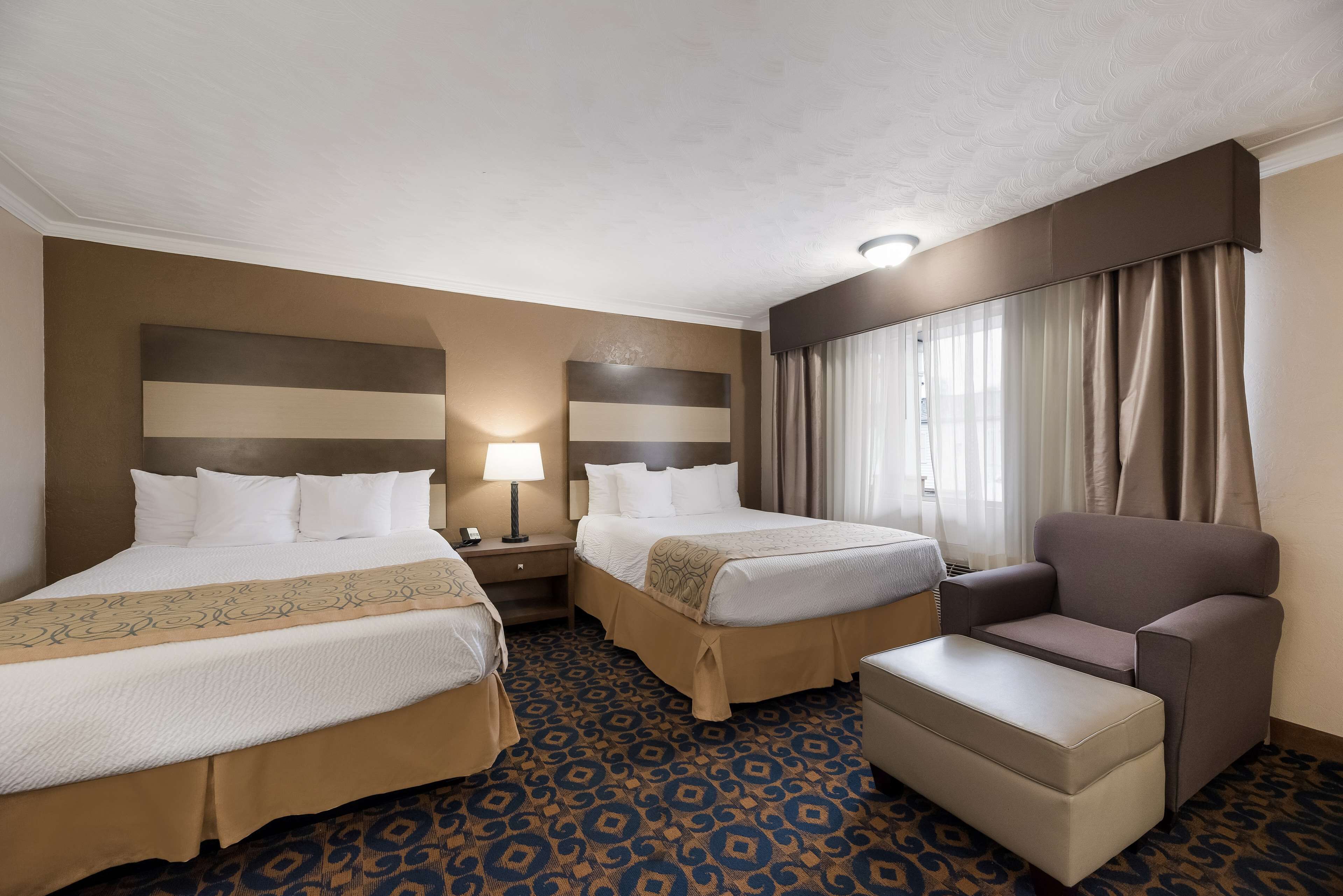 standard room, 2 queen beds, non smoking | desk, laptop workspace, iron/ironing board, cots/infant beds