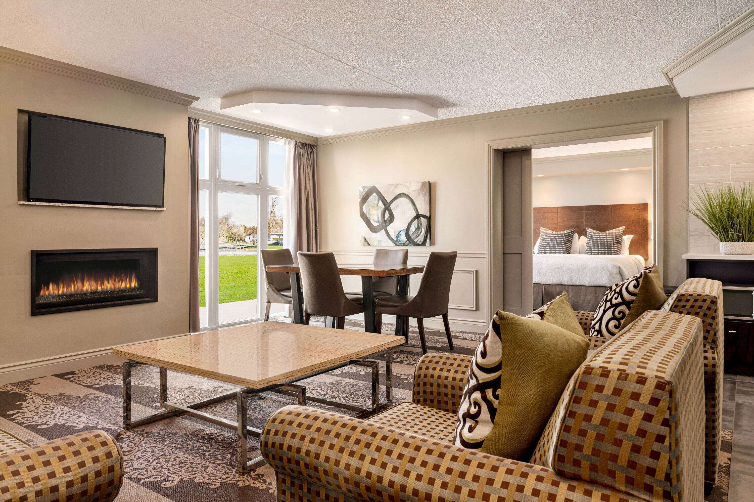 luxury suite, 1 bedroom, non smoking (stair access only) | hypo-allergenic bedding, desk, blackout curtains, iron/ironing board