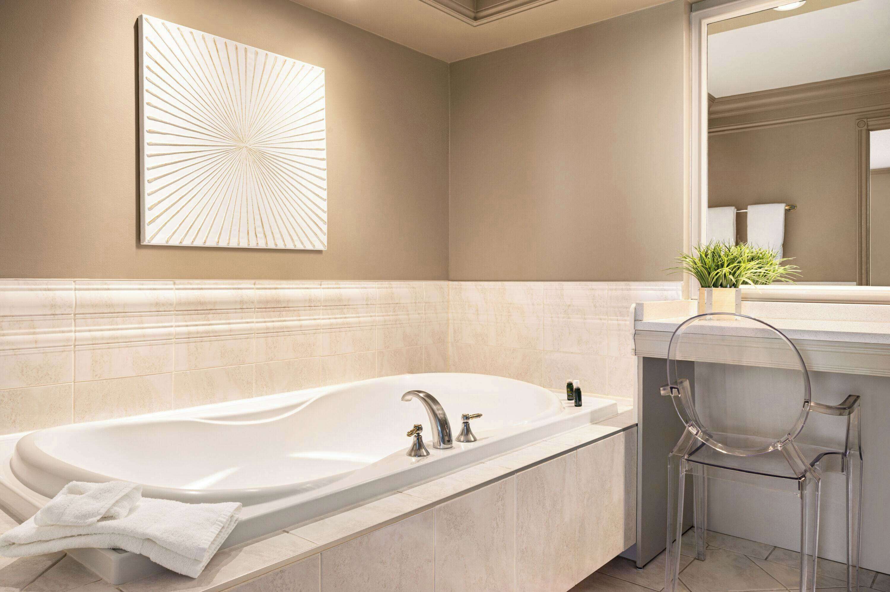 luxury suite, 1 bedroom, non smoking (stair access only) | bathroom | free toiletries, hair dryer, towels