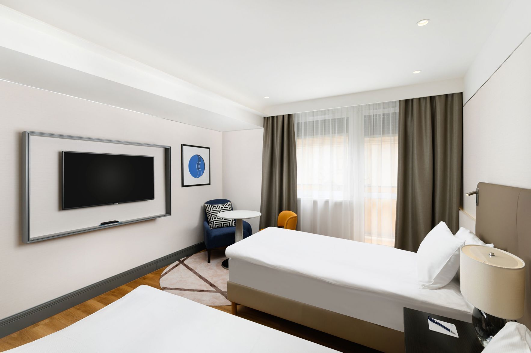 Hypo-allergenic bedding, in-room safe, desk, laptop workspace