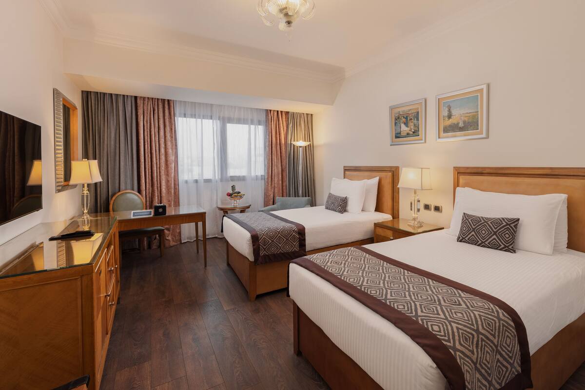 Executive Tower Room | Select Comfort beds, minibar, in-room safe, desk