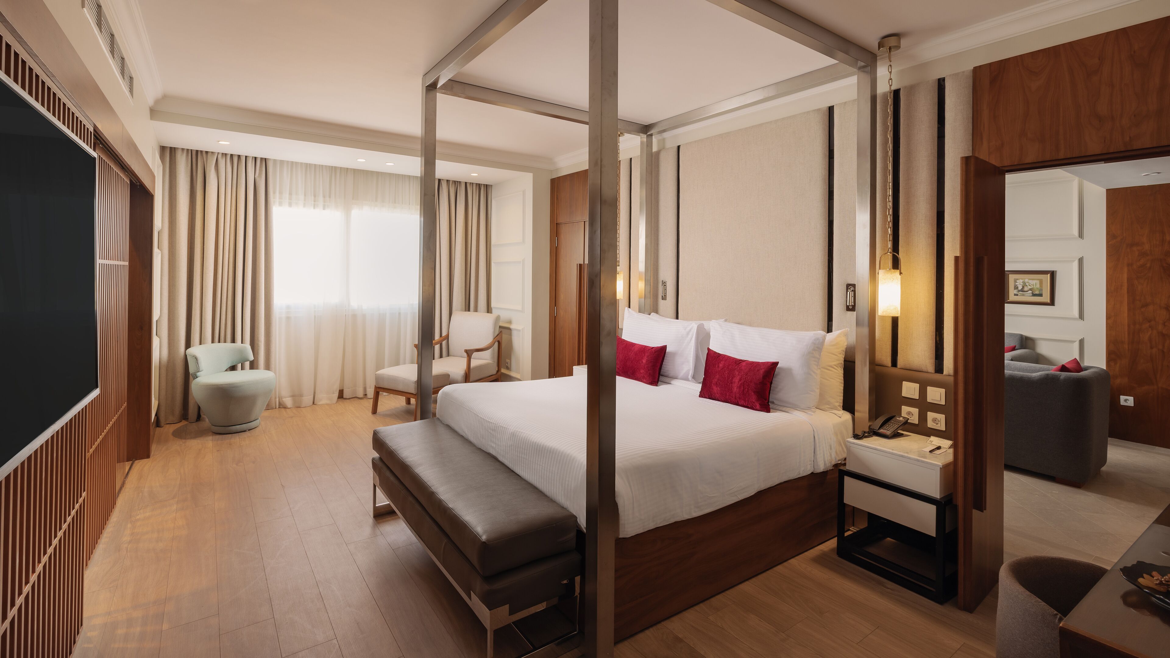 Deluxe Suite, City View | Select Comfort beds, minibar, in-room safe, desk