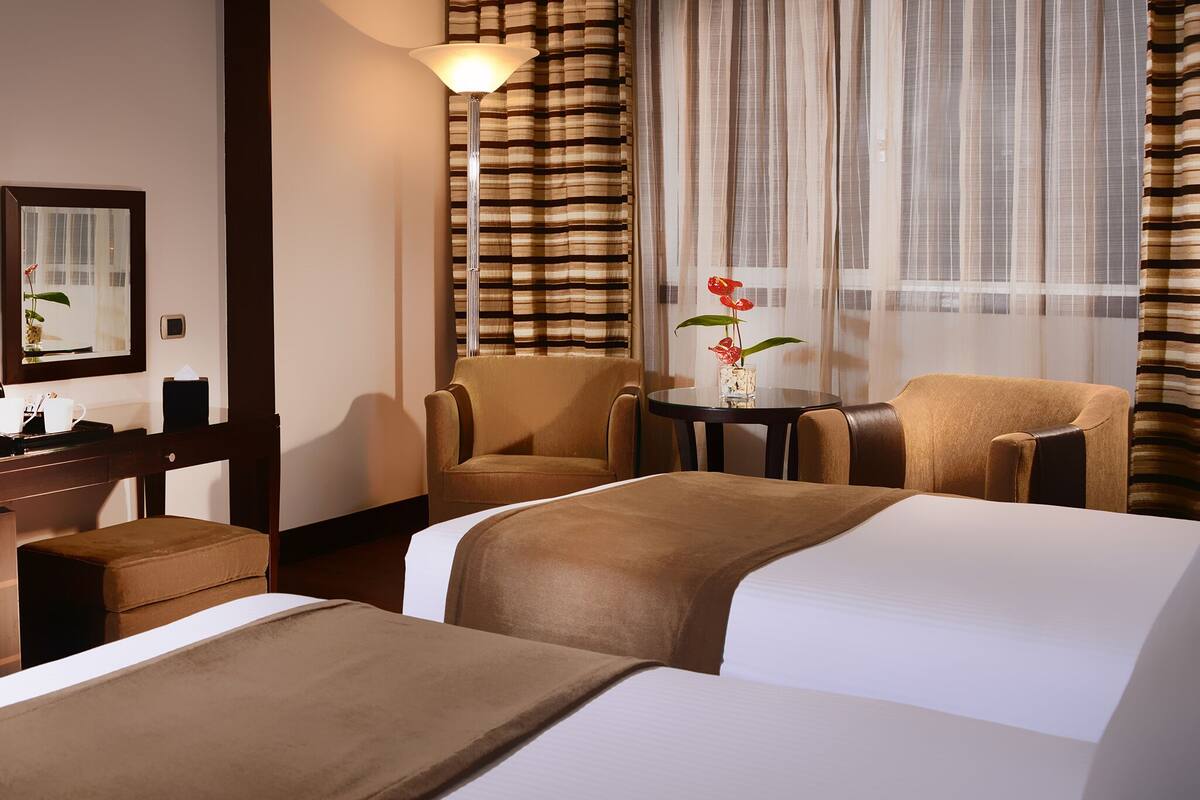 Select Comfort beds, minibar, in-room safe, desk