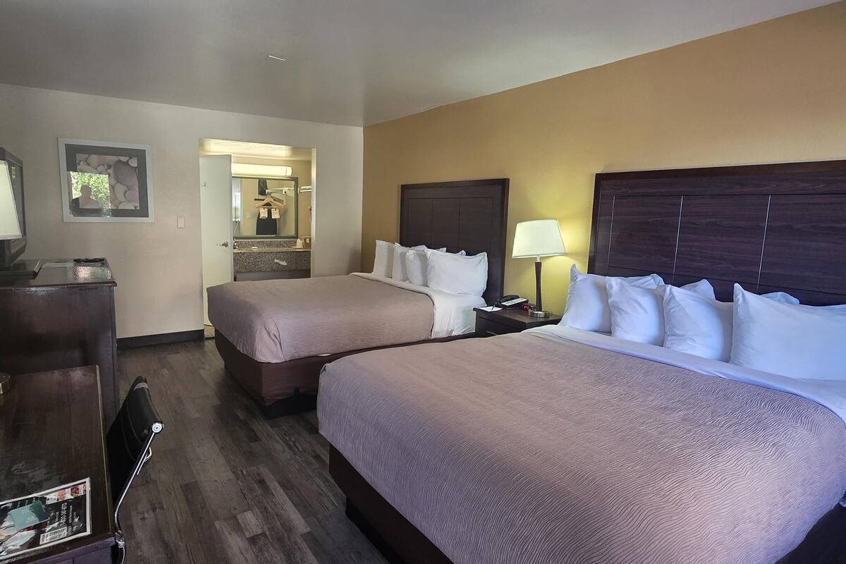 Premium bedding, down comforters, desk, blackout drapes