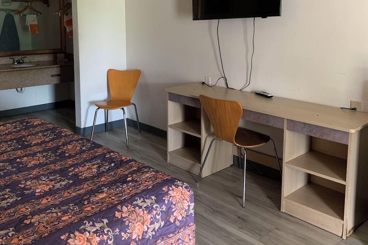 Basic Double Room | Blackout drapes, iron/ironing board, free WiFi, bed sheets