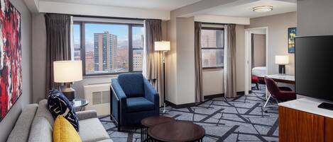 Suite, 1 Bedroom | Living area | 37-inch TV with premium TV channels, DVD player, iPod dock