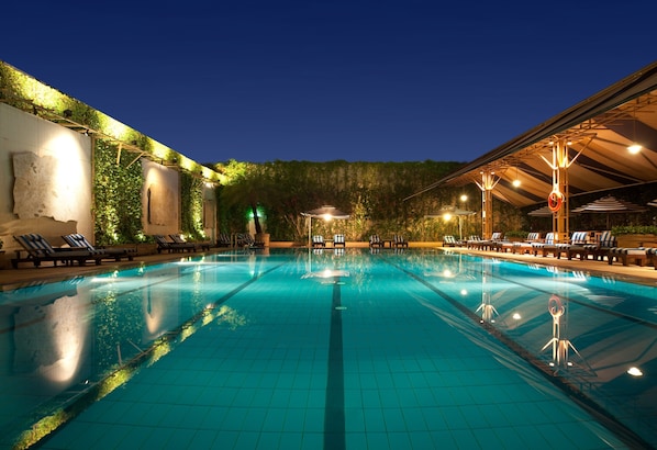 Outdoor pool, open 6:00 AM to 11:00 PM, sun loungers