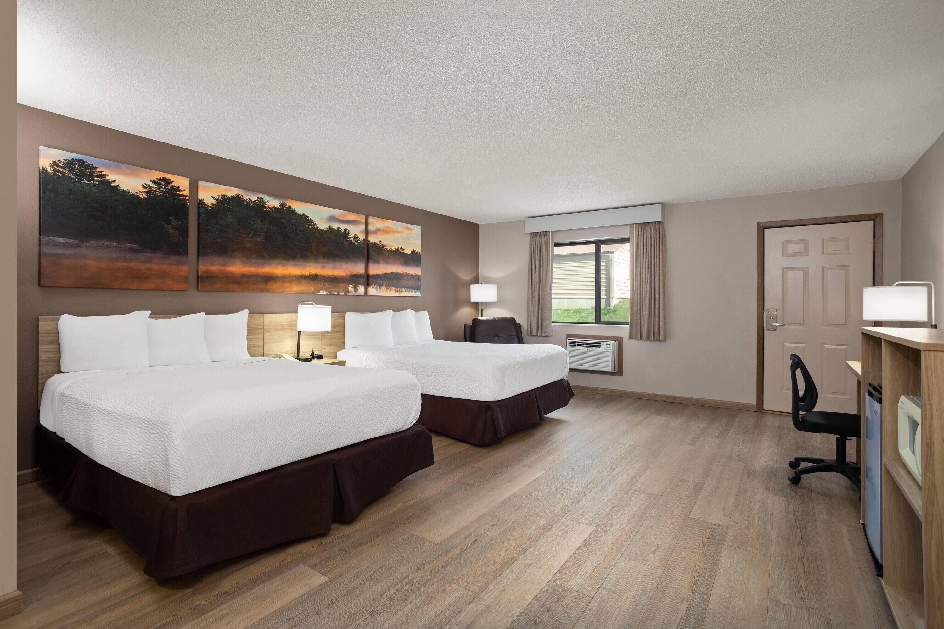 Standard Room, 2 Queen Beds | Free cribs/infant beds, rollaway beds, free WiFi, bed sheets