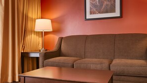 Pillowtop beds, desk, blackout drapes, iron/ironing board