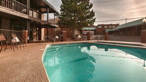 Seasonal outdoor pool, pool loungers