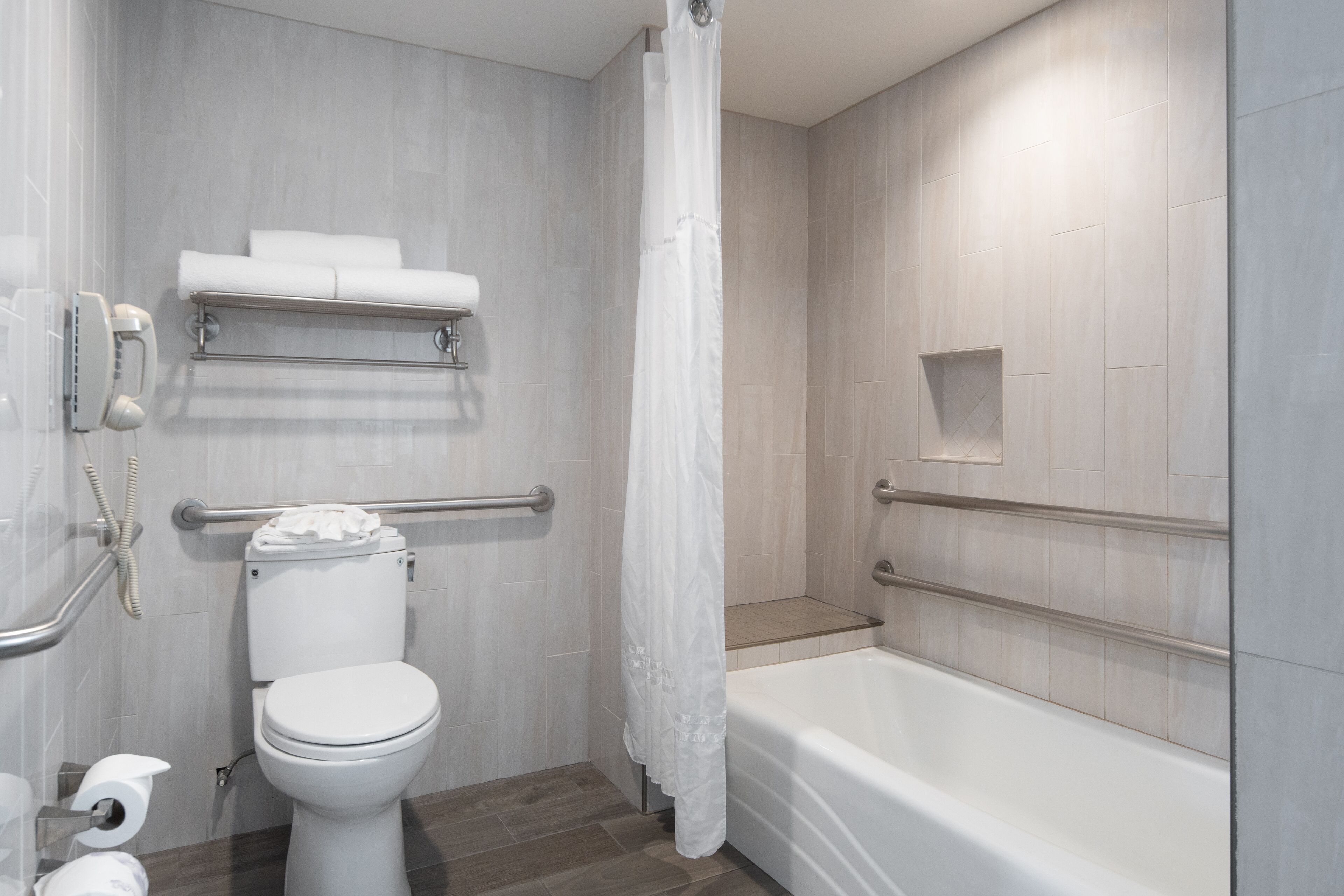 designer toiletries, hair dryer, towels, shampoo