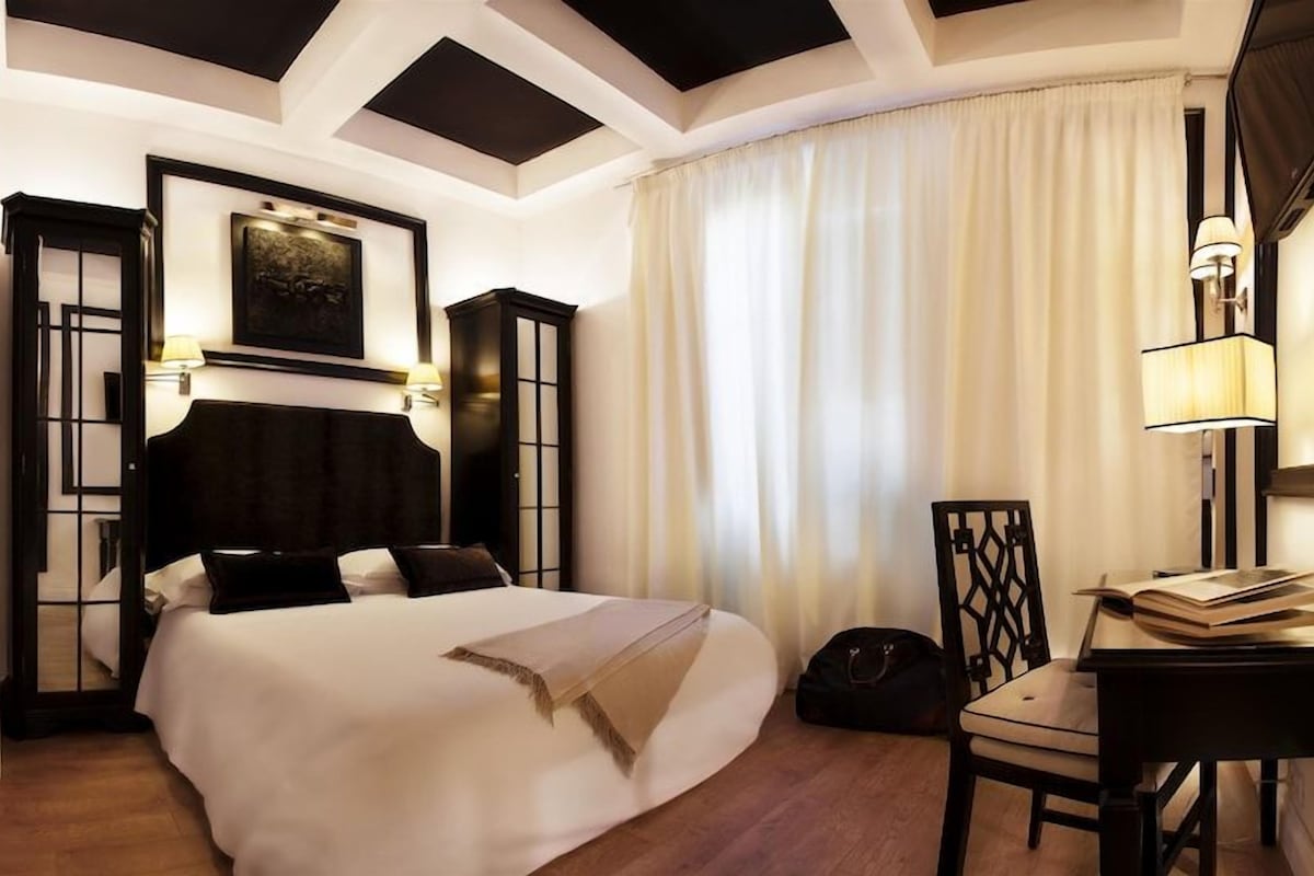 Ropa de cama de alta calidad y minibar 