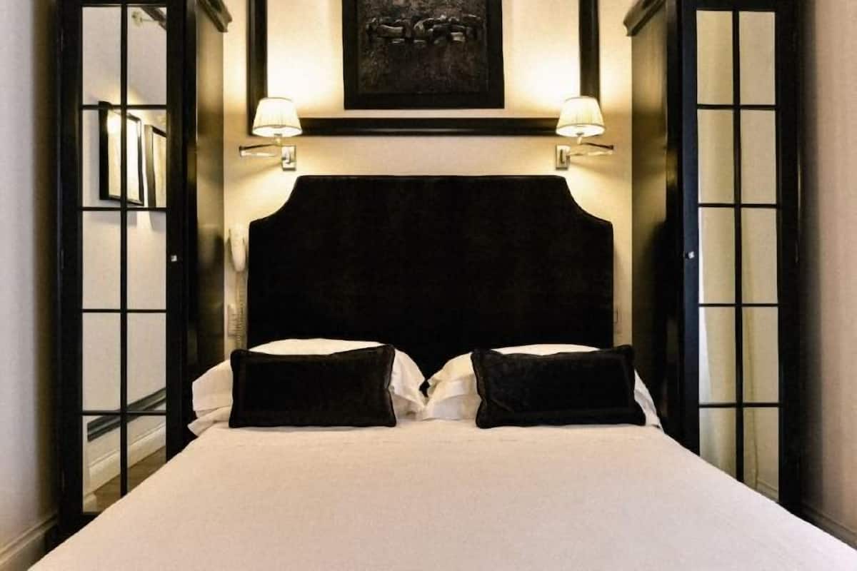 Ropa de cama de alta calidad y minibar