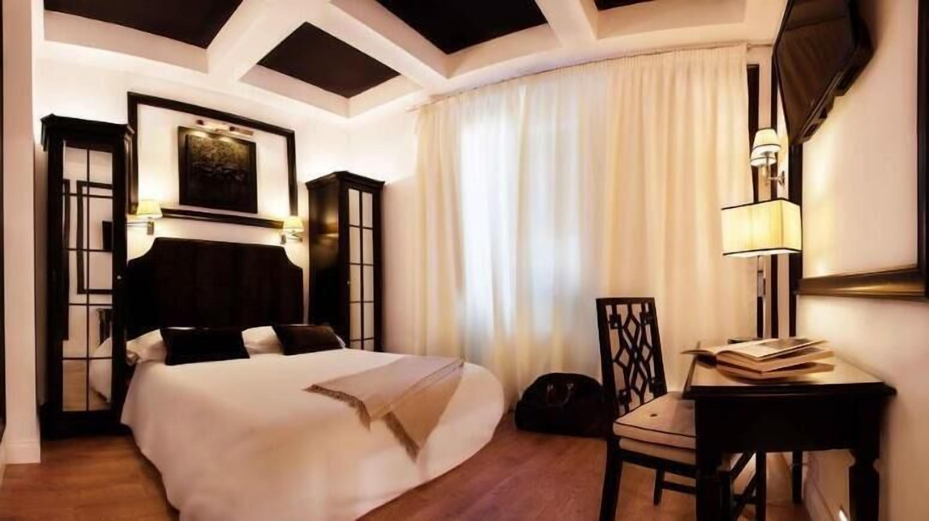 Ropa de cama de alta calidad y minibar 