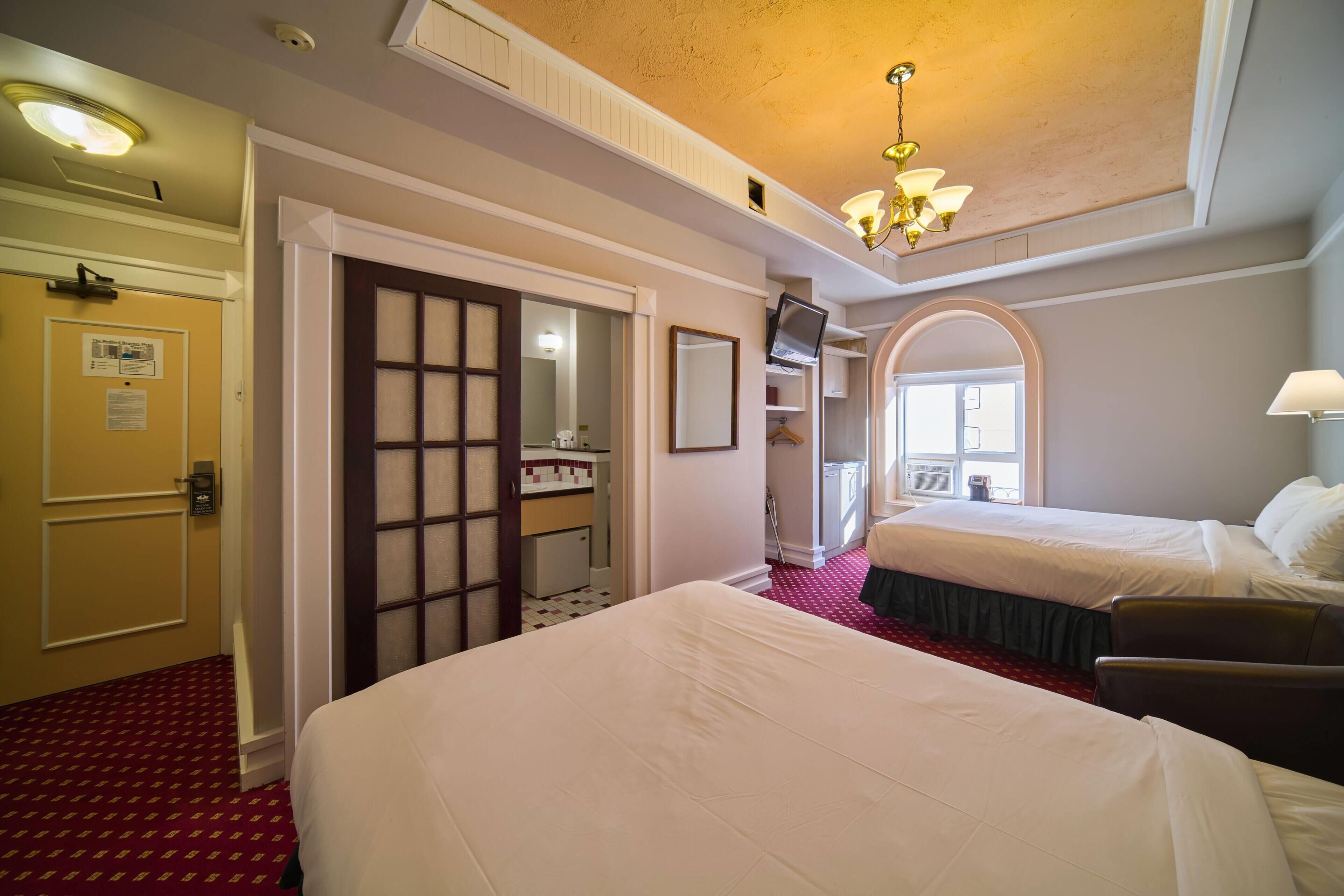 Deluxe Room, 2 Queen Beds, Non Smoking | Premium bedding, blackout drapes, iron/ironing board, free WiFi