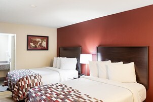 Deluxe Room, 2 Double Beds, Non Smoking | Desk, iron/ironing board, free cribs/infant beds, free WiFi