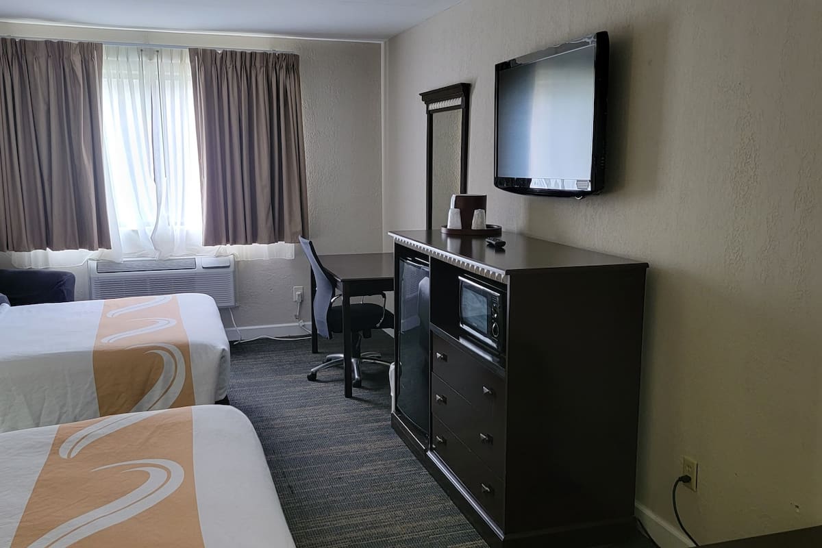 Desk, blackout curtains, iron/ironing board, free cots/infant beds