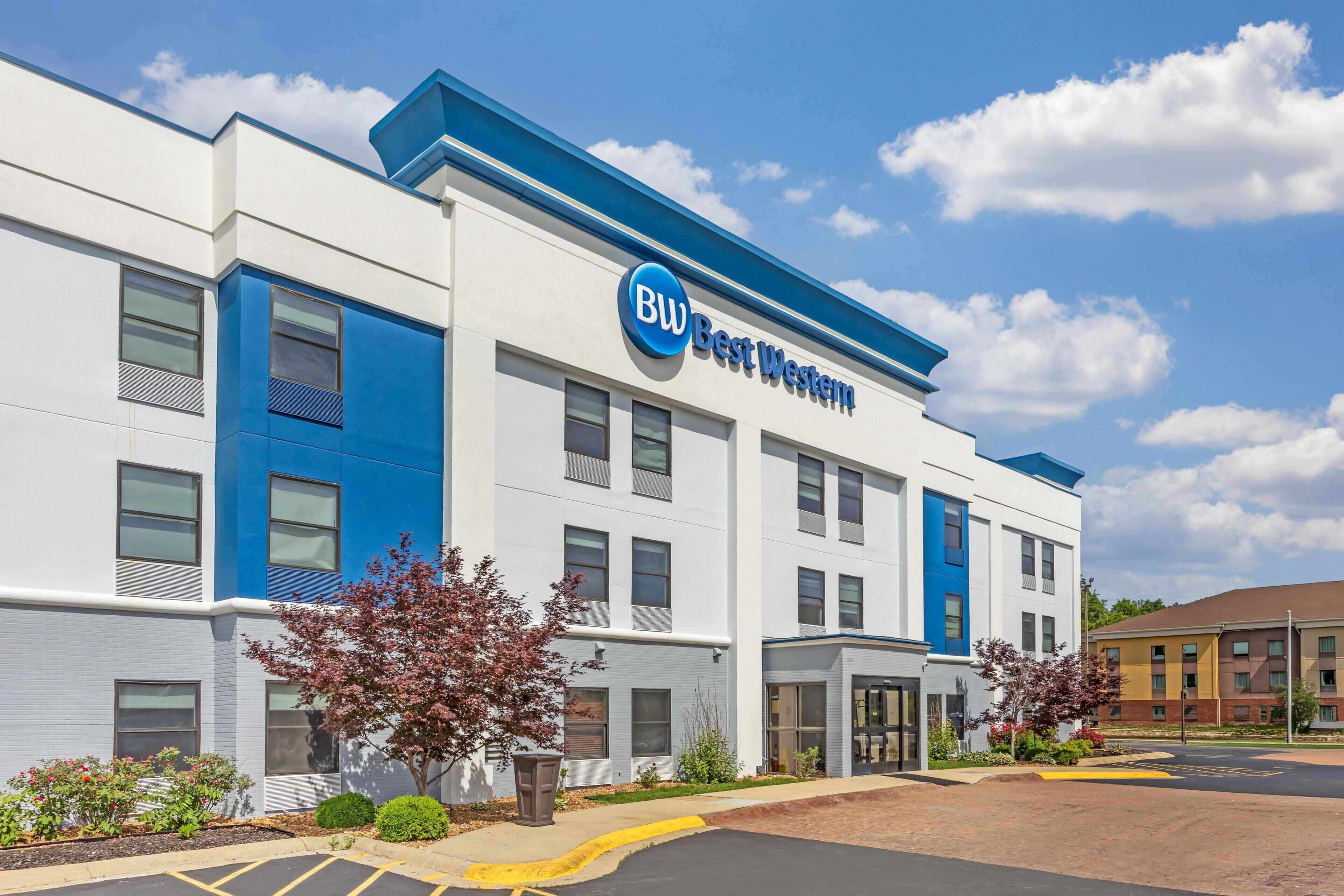A modern building with a sign reading 'BW Best Western.'