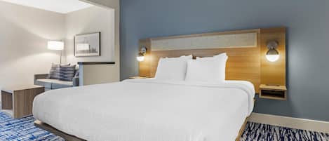 Suite, 1 King Bed, Non Smoking (with Single Sofabed) | Hypo-allergenic bedding, desk, laptop workspace, iron/ironing board
