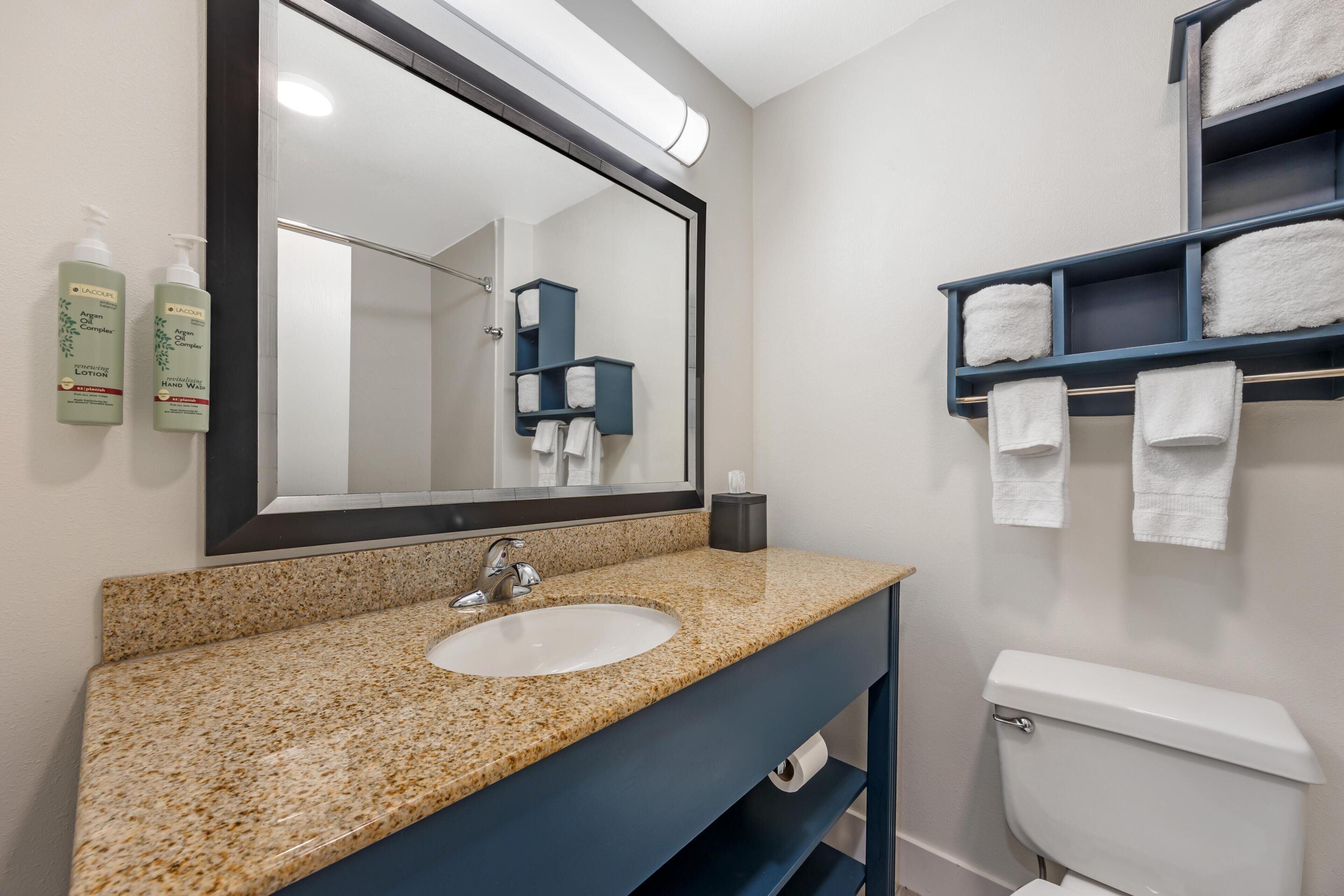 Eco-friendly toiletries, hair dryer, towels, soap
