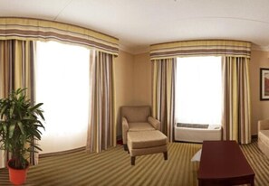 Standard Suite | Living area | 42-inch flat-screen TV with cable channels, TV