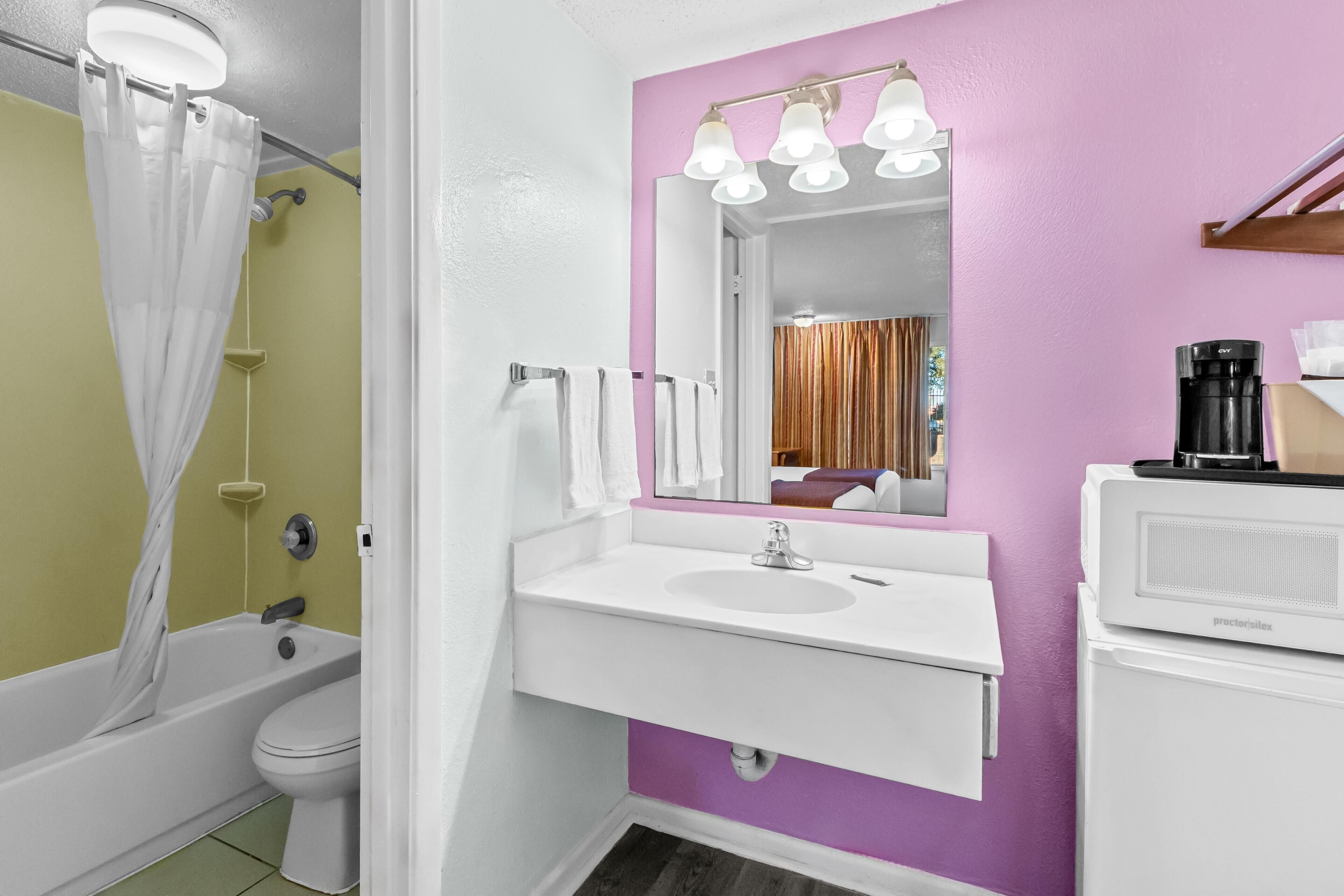Room, 2 Double Beds | Bathroom | Combined shower/bathtub, free toiletries, towels