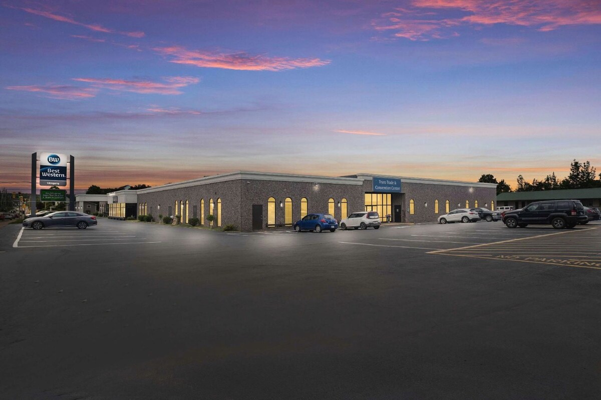 A Best Western hotel with a parking lot and a convention center.