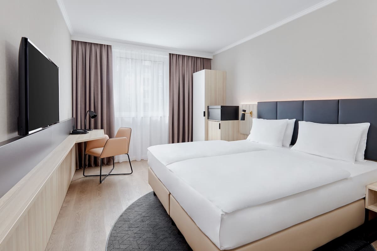 Hypo-allergenic bedding, in-room safe, desk, laptop workspace