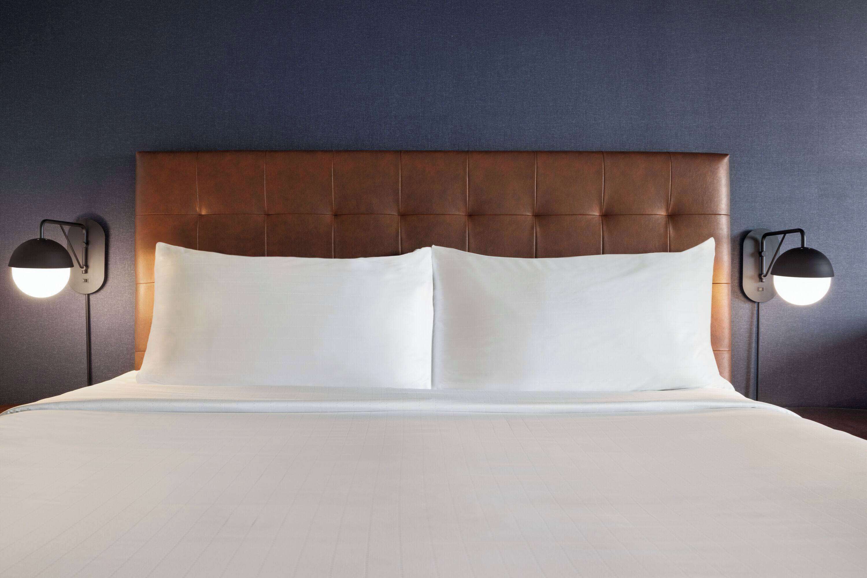 Down comforters, pillowtop beds, in-room safe, desk