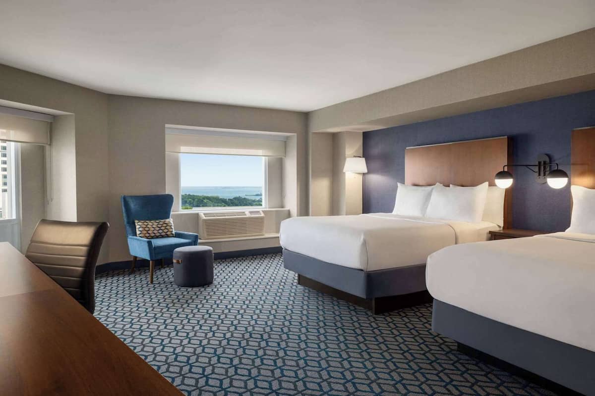 Down duvets, pillow-top beds, in-room safe, desk