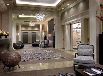 Hotel entrance and lobby at The Alexis Royal Sonesta Hotel Seattle