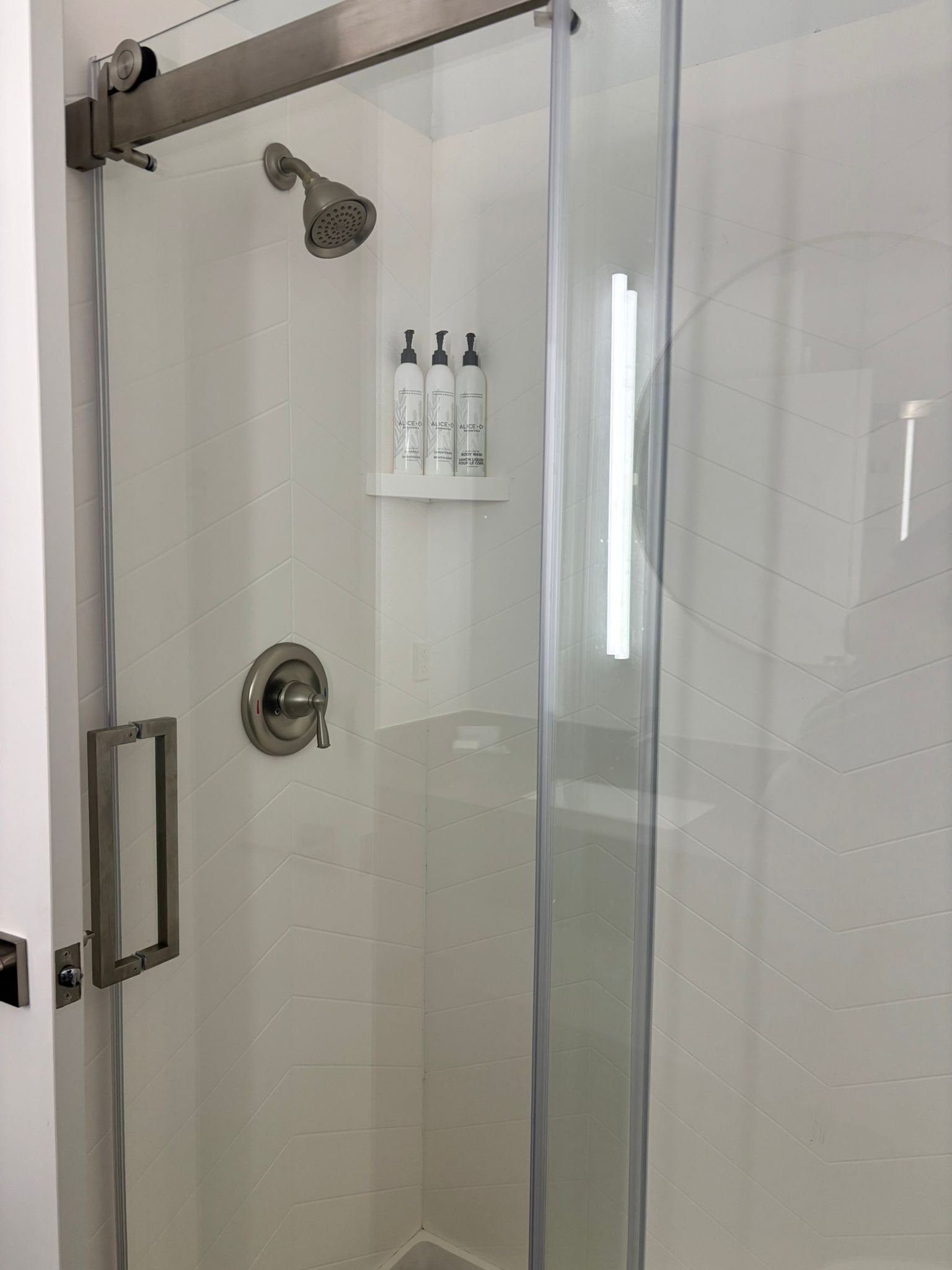 combined shower/bathtub, free toiletries, hair dryer, towels