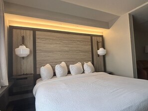 Luxe beddengoed, een kluis op de kamer, een bureau