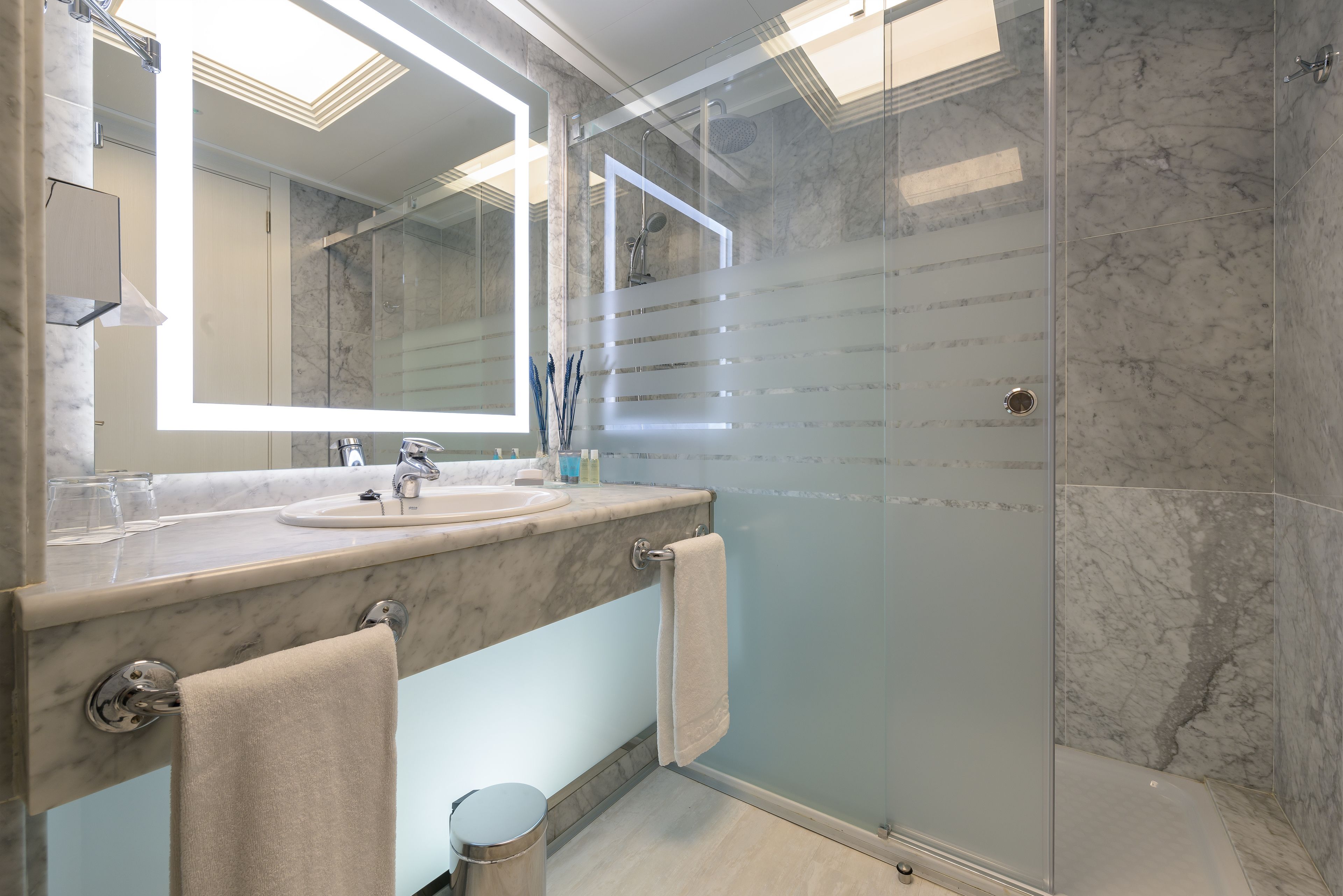 eco-friendly toiletries, hair dryer, bidet, towels