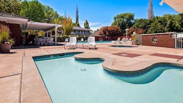 Seasonal outdoor pool, pool loungers