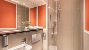 Shower, eco-friendly toiletries, hair dryer, towels