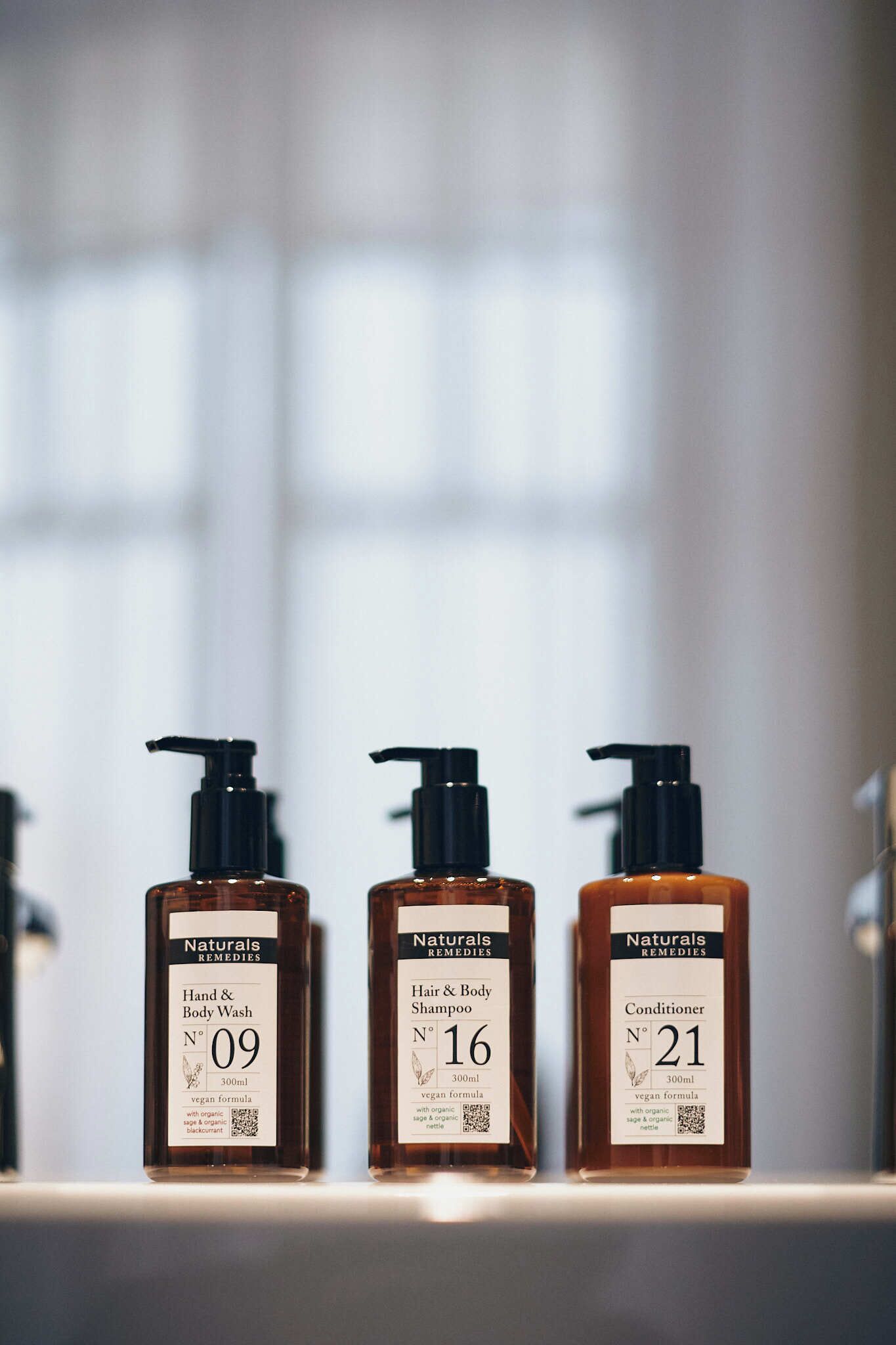 Three bottles of Naturals Remedies products on a shelf.