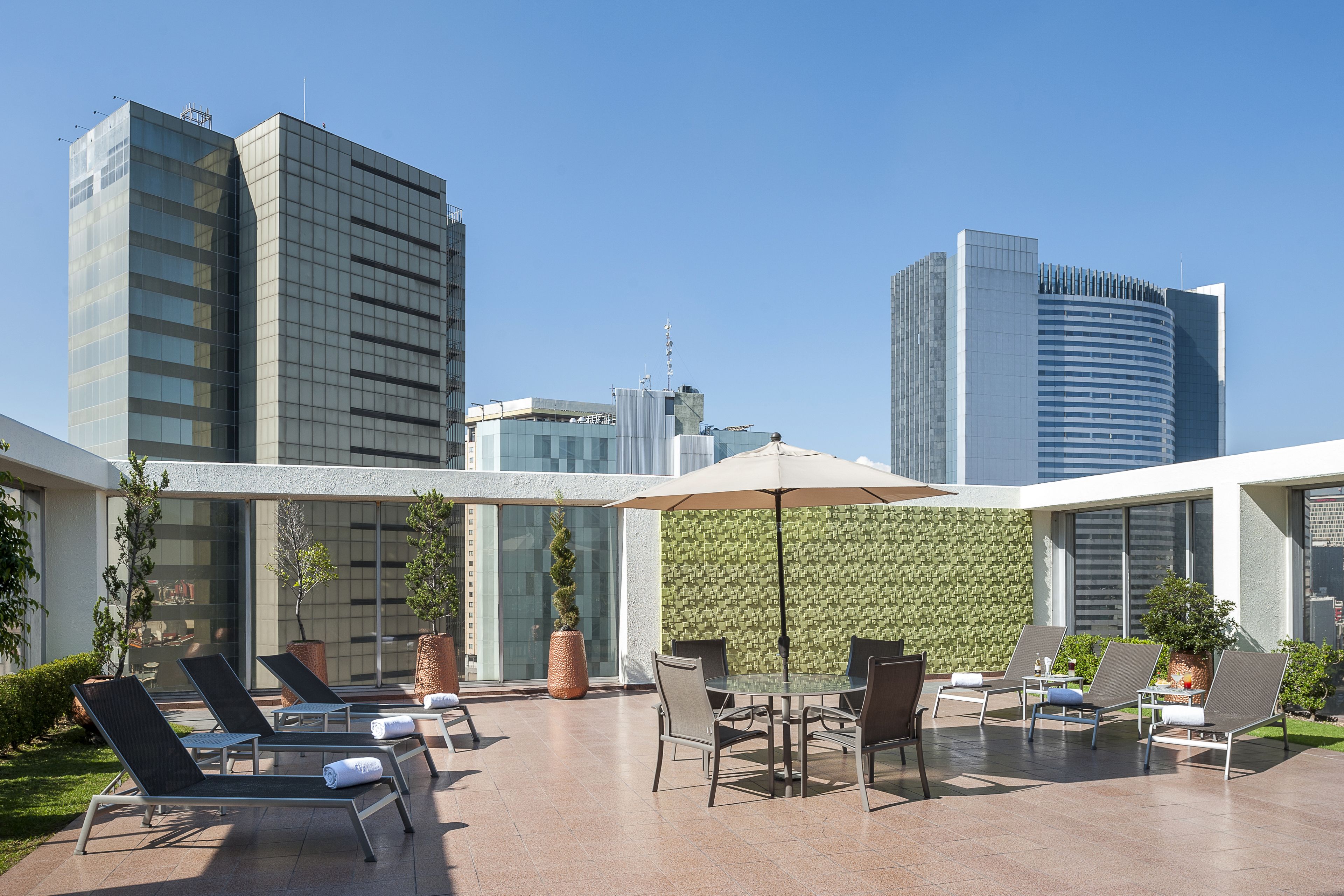 outdoor pool, open 9:00 am to 8:00 pm, pool loungers