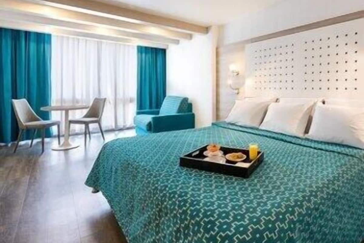 In-room safe, desk, laptop workspace, blackout curtains