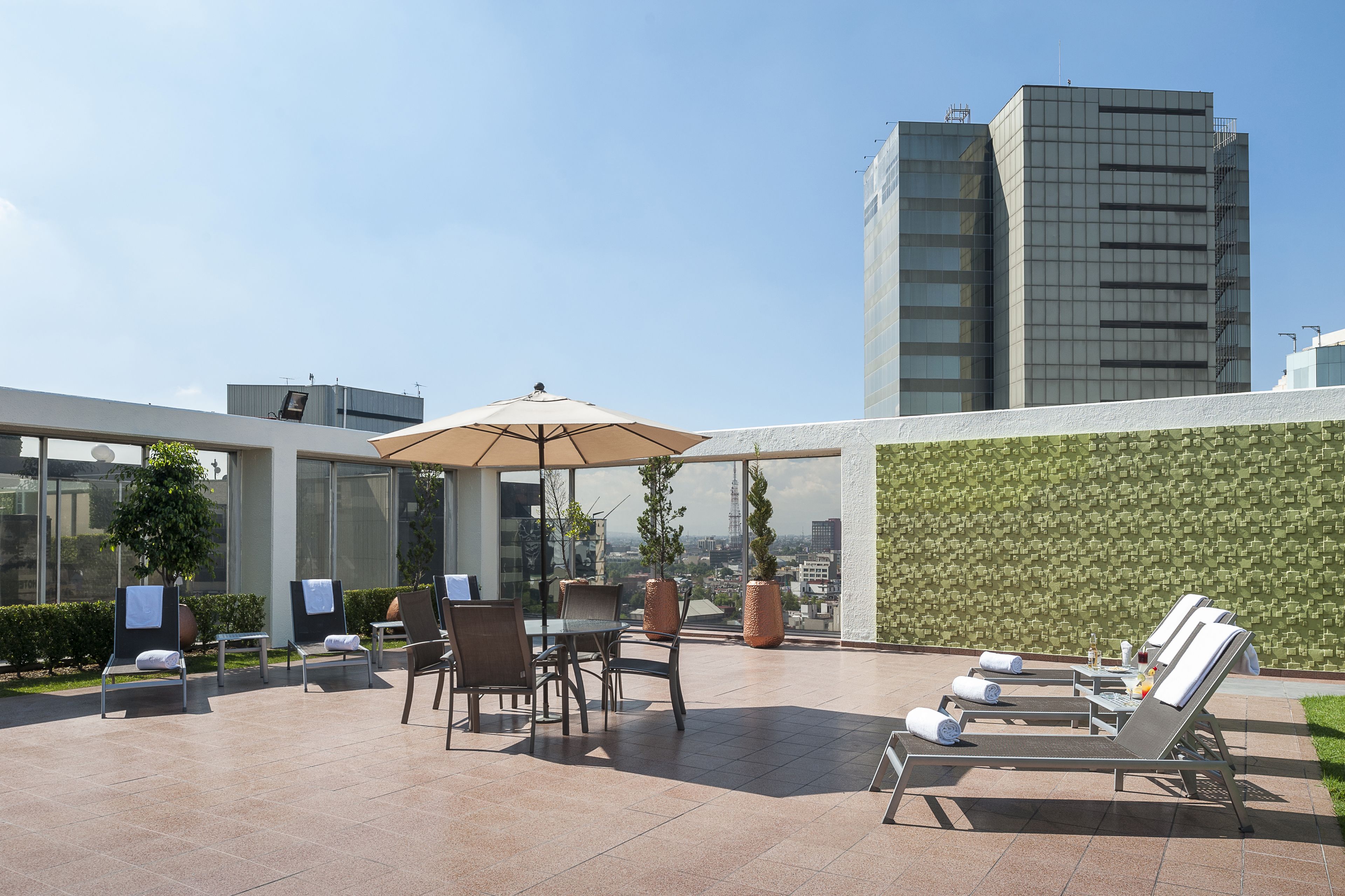 outdoor pool, open 9:00 am to 8:00 pm, pool loungers