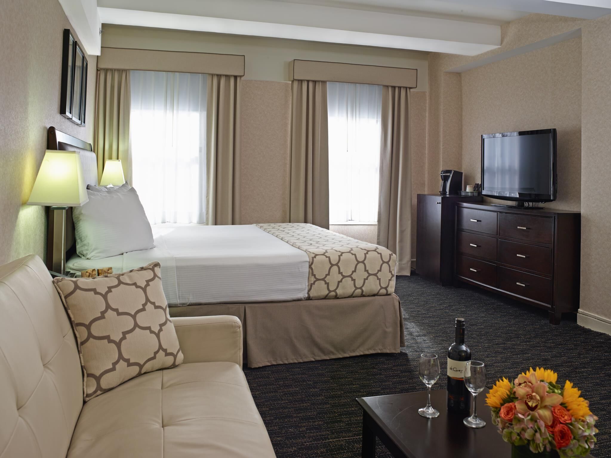 Premium bedding, down comforters, pillowtop beds, in-room safe