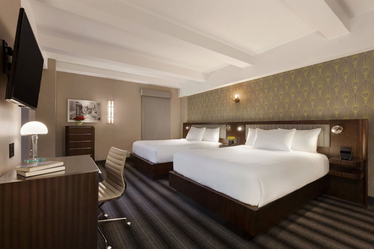 Premium bedding, down comforters, pillowtop beds, in-room safe