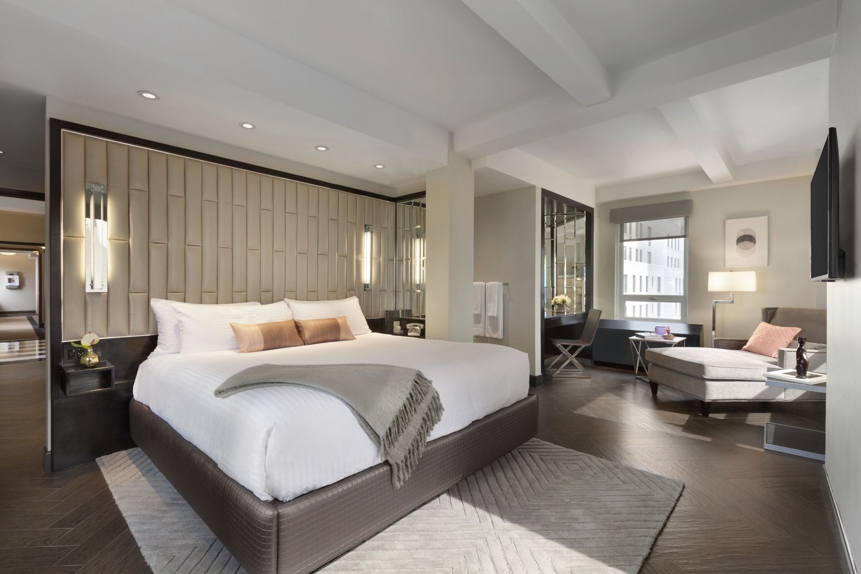 Premium bedding, down comforters, pillowtop beds, in-room safe