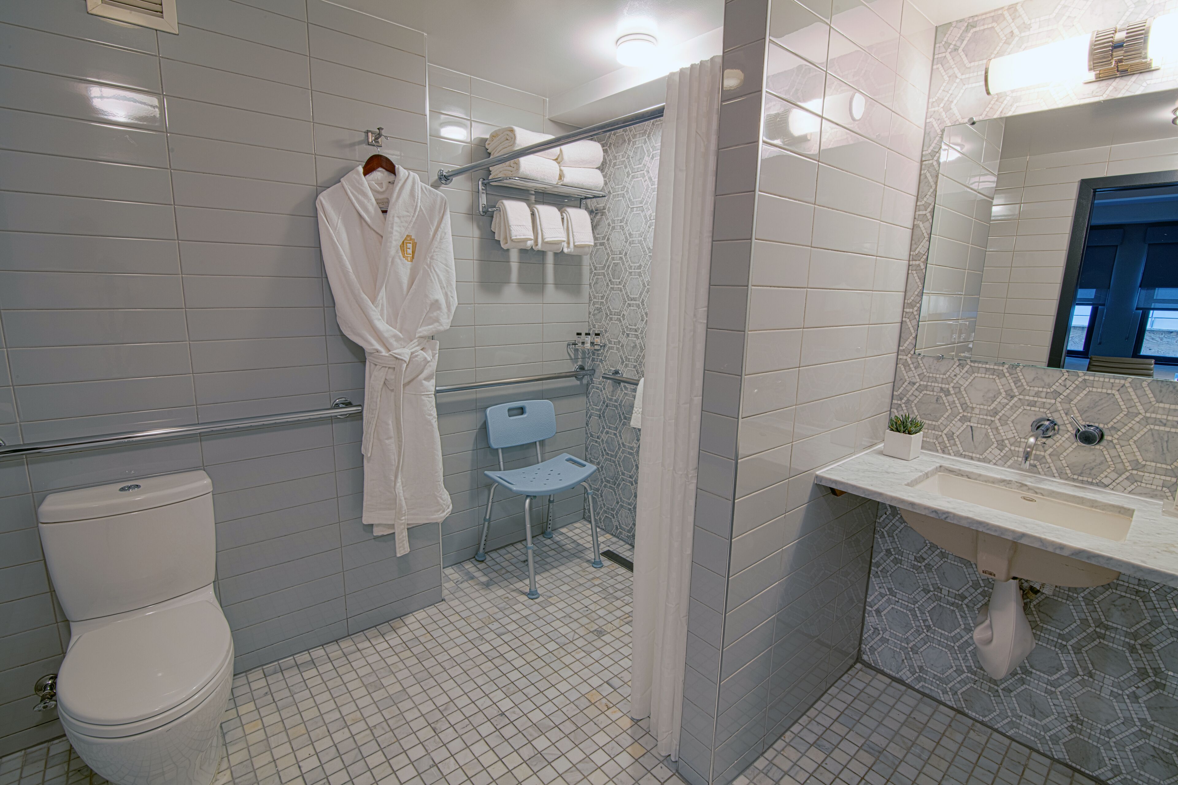 Eco-friendly toiletries, hair dryer, bathrobes, towels