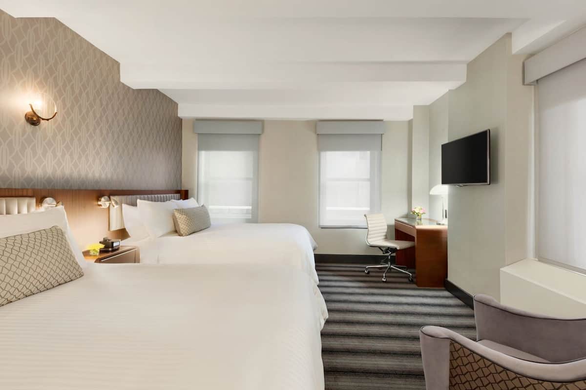Premium bedding, down comforters, pillowtop beds, in-room safe