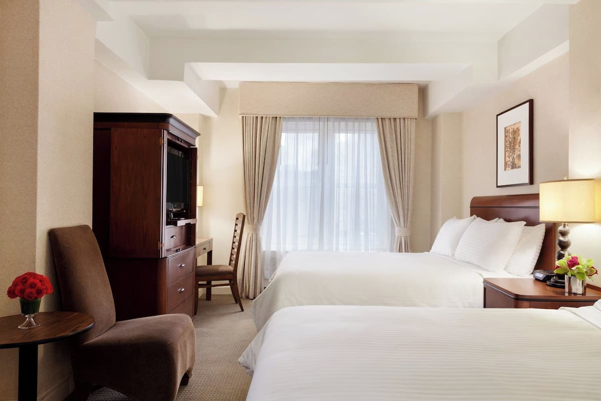 Premium bedding, down comforters, pillowtop beds, in-room safe