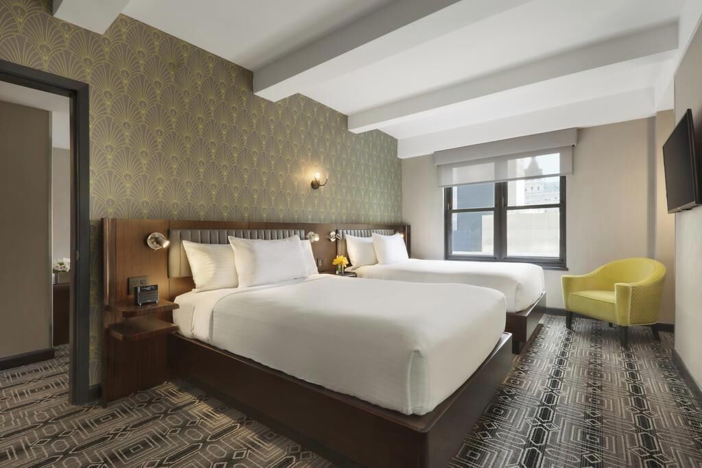 Premium bedding, down comforters, pillowtop beds, in-room safe