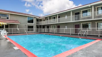 Outdoor pool, open 10 AM to 10:00 PM, pool umbrellas, sun loungers