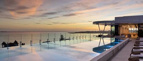 Indoor pool, outdoor pool, pool umbrellas